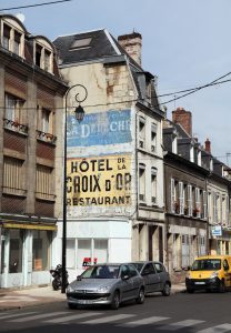 Old advertising mural in Soissons